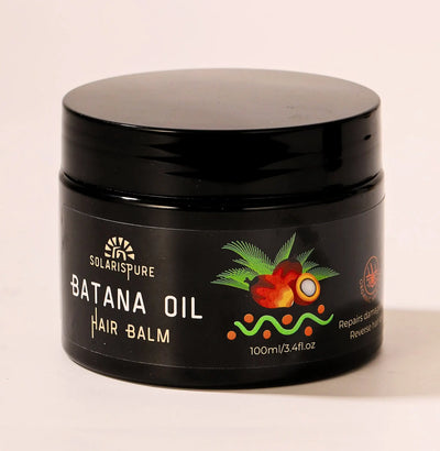 Black jar of Batana Oil Hair Balm with branding on a beige background