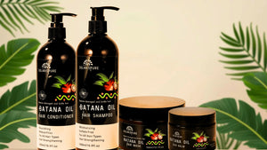 Sun&Nature Batana Oil hair care products with pump bottles and a jar on a leafy background